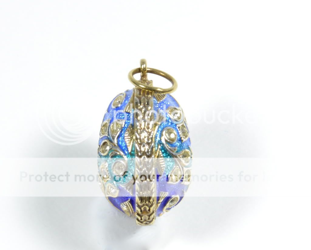 These miniature Enameled egg pendants are Fabergé esque. Lovely in 